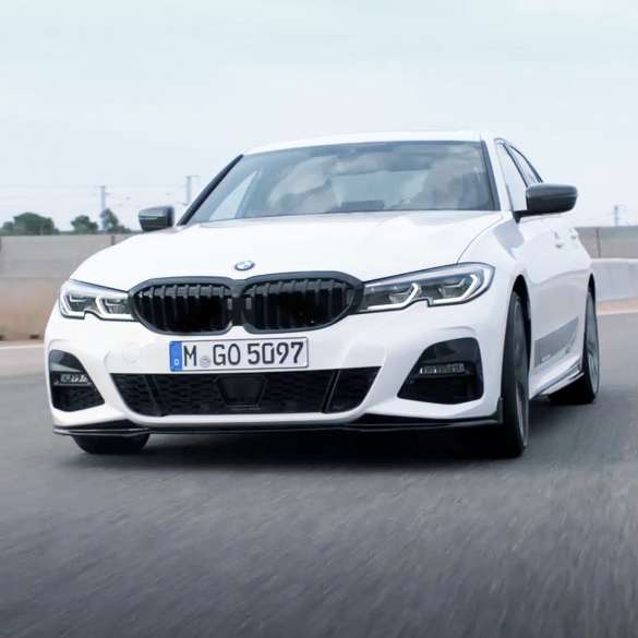 BMW 3 Series Sedan 2018: white car with M Performance. BMW 3 Series Sedan 2018: white car with M Performance.