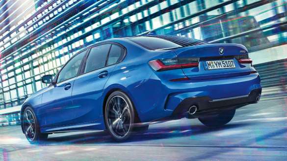 BMW 3 Series Sedan, Adaptive M suspension. Three-quarter rear view of the driving BMW 3 Series Sedan with Adaptive M suspension.