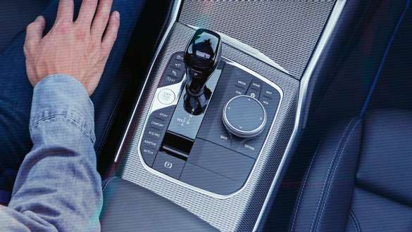 BMW 3 Series Sedan, Steptronic Sport transmission. Detailed bird's eye view of the centre console of the BMW 3 Series Sedan with gear lever and Steptronic Sport transmission.