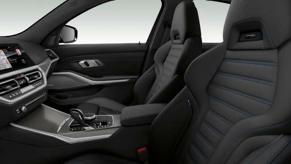 BMW 3 Series Sedan, sport seats Close-up side view of the front row seats with black sport seats for driver and front passenger.