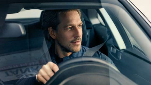 BMW Service Inclusive BMW Service Inclusive man driving a BMW
