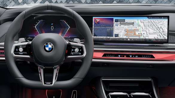 Driver operates the central display in the BMW Driver operates the central display in the BMW via touch function