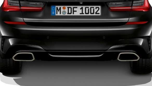 Exclusive tailpipe trims BMW M340i xDrive Sedan 2020 Sapphire Black metallic tailpipe trims close-up