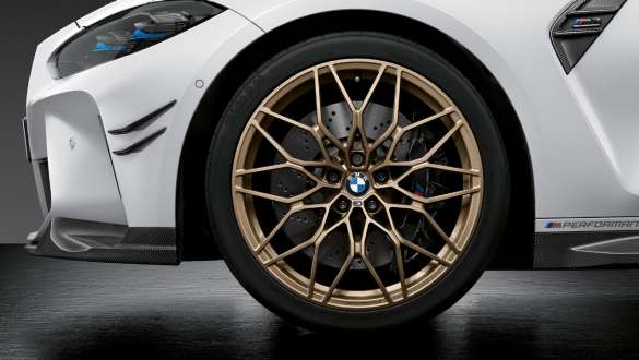 M Performance forged wheel Cross-spoke style 1000 M Frozen Gold Bronze BMW M4 Competition Cabriolet with M xDrive G83 2021 BMW M4 Competition Cabriolet with M xDrive G83 2021 M Performance forged wheel Cross-spoke style 1000 M Frozen Gold Bronze close-up