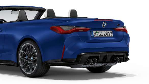 Rear design BMW M4 Competition Cabriolet with M xDrive G83 2021 BMW M4 Cabrio exterior Competition G83 2021 BMW Individual Frozen Portimao Blue metallic Rear design three-quarter rear view