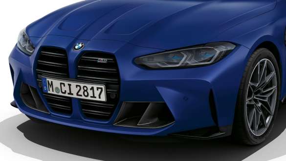 Front design BMW M4 Competition Cabriolet with M xDrive G83 2021 BMW M4 Competition Cabriolet with M xDrive G83 2021 BMW Individual Frozen Portimao Blue metallic front design three-quarter front view