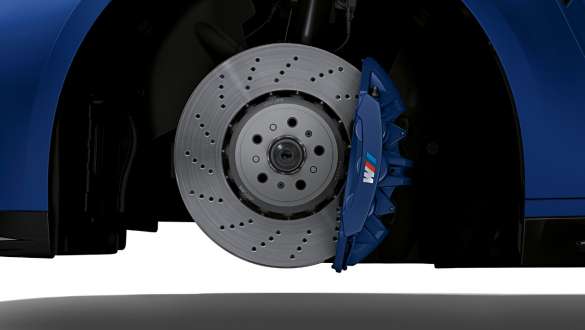 M Compound brakes in blue BMW M4 Competition Cabriolet with M xDrive G83 2021 BMW M4 Competition Cabriolet with M xDrive G83 2021 M Compound brakes in blue close-up