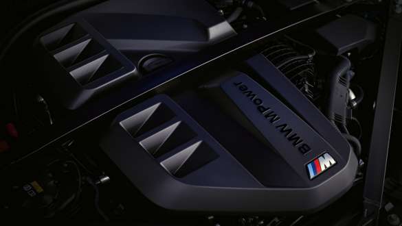 High-performance BMW M TwinPower Turbo inline 6-cylinder petrol engine BMW M4 Competition Cabriolet with M xDrive G83 2021 BMW M4 Competition Cabriolet with M xDrive G83 2021 high-performance BMW M TwinPower Turbo inline 6-cylinder petrol engine close-up engine cover