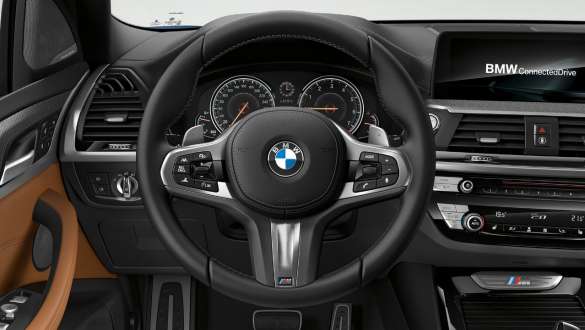 BMW X3 M40i, M leather steering wheel. BMW X3 M40i, interior, cockpit with M leather steering wheel.