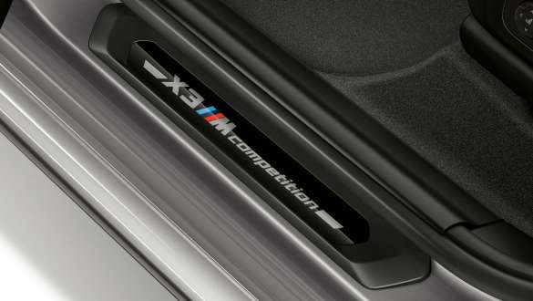 BMW X3 M Competition, door sill finisher with Competition designation. BMW X3 M Competition, interior, door sill finisher with Competition designation.