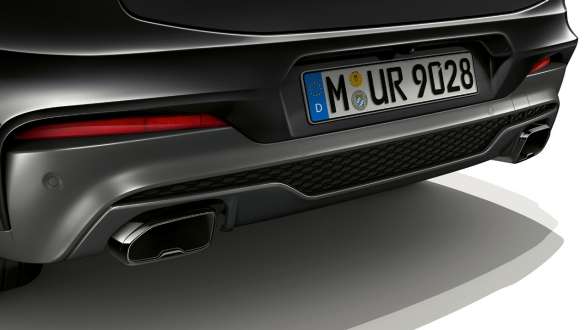 BMW X4 M40i, exhaust pipes in Black Chrome. BMW X4 M40i in Black Sapphire metallic, exterior, exhaust pipes in Black Chrome.