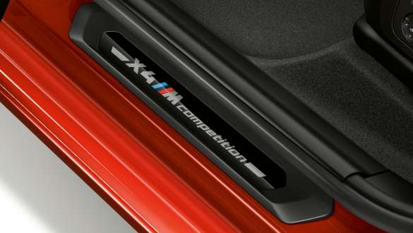 BMW X4 M Competition, door sill finishers with Competition designation. BMW X4 M Competition, interior, door sill finishers with Competition designation.