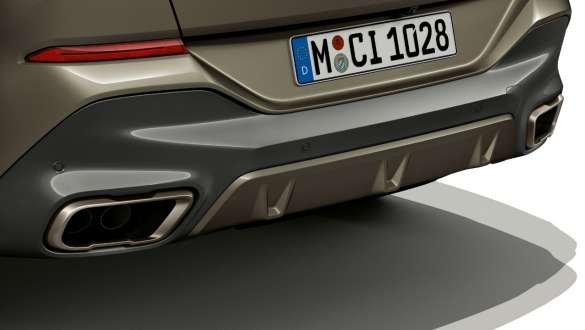 BMW X6 M50i SUV Rear with M sport exhaust system BMW X6 M50i SUV rear with focus on M sport exhaust system