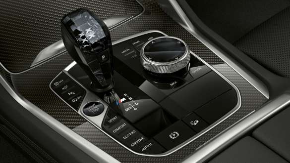 BMW X6 M50i SUV Gear lever with M badge G06 Close-up of the BMW X6 M50i interior Gear lever with M badge G06 SUV