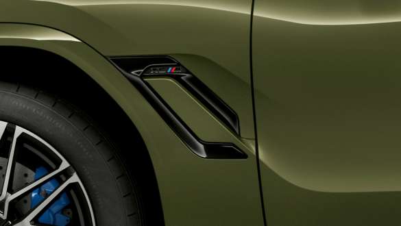 M side gills of the BMW X6 M Competition SUV M side gills BMW X6 M Competition F96 SUV BMW Individual Special Paint Urban Green exterior