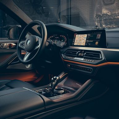 BMW X6 M50i SUV cockpit BMW X6 M50i SUV cockpit driver oriented