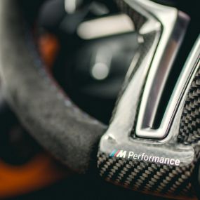 M Performance steering wheel Pro carbon fibre Alcantara close-up BMW M Performance Parts M Performance steering wheel Pro carbon fibre Alcantara close-up