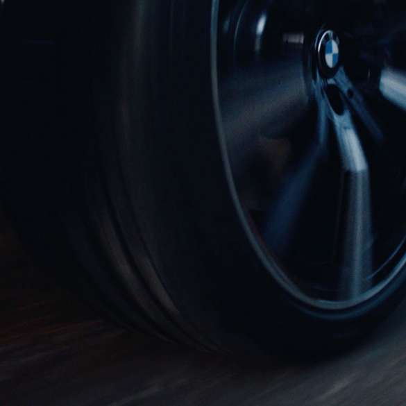Rotating BMW rim with BMW logo Rotating BMW rim with BMW logo