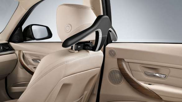 BMW basic carrier BMW basic carrier is attached to the back of a brown seat