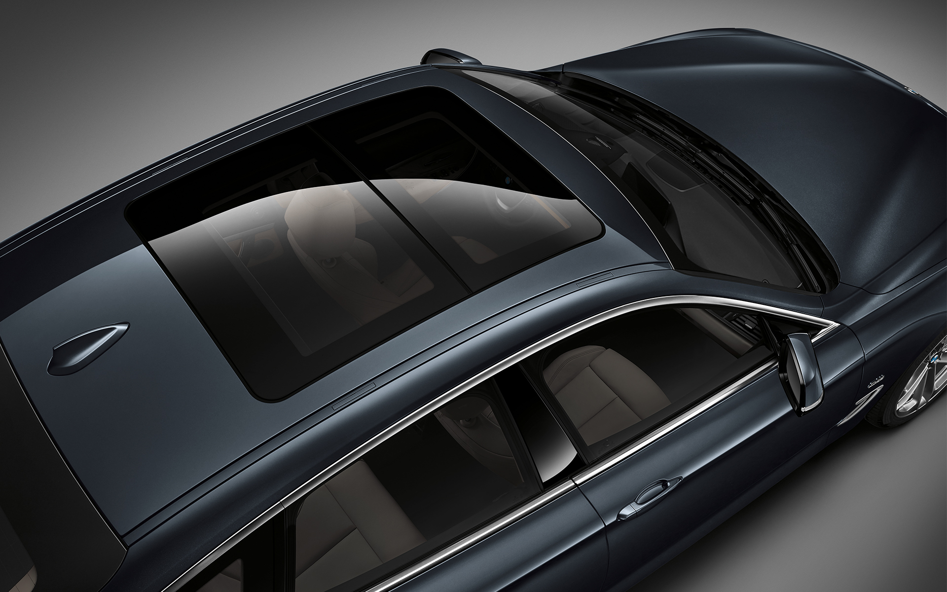 BMW 3 Series Gran Turismo: top view of elegant carbon roof. BMW 3 Series Gran Turismo: top view of elegant carbon roof.