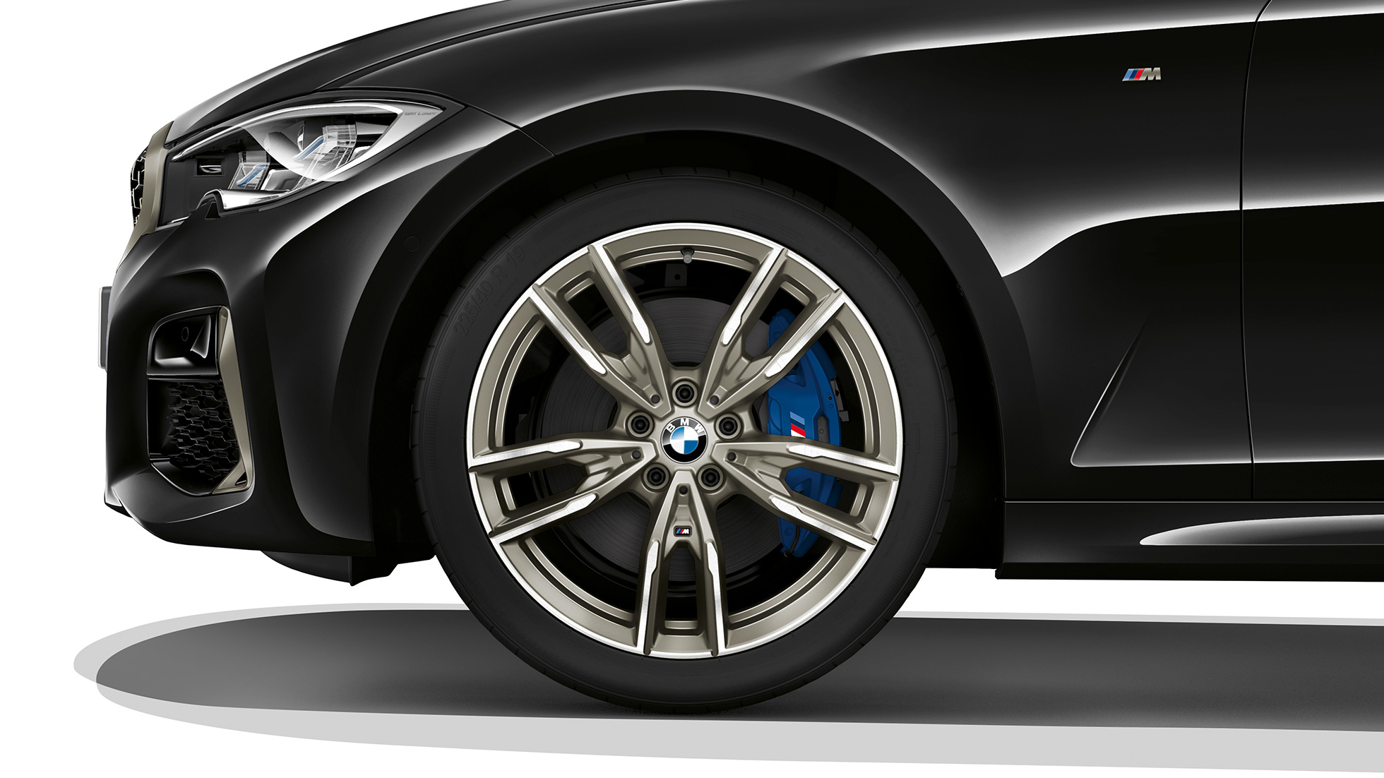 BMW 3 Series Sedan, M340i xDrive light alloy wheel. Close-up of the light alloy wheel of the BMW 3 Series M340i xDrive Sedan.