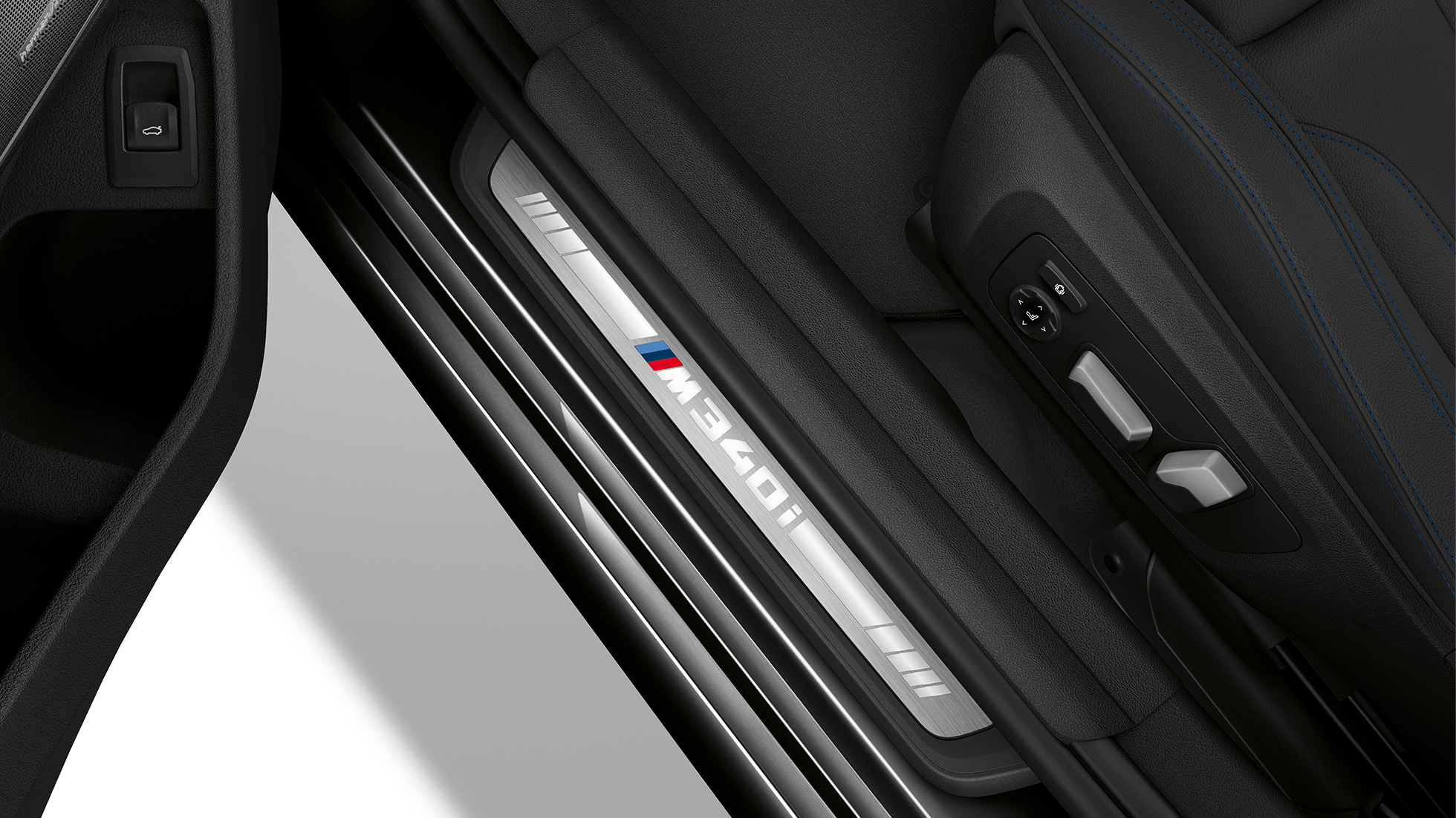 BMW 3 Series Sedan, M340i xDrive entry sill. Top view of the door sill of the BMW 3 Series M340i xDrive Sedan.