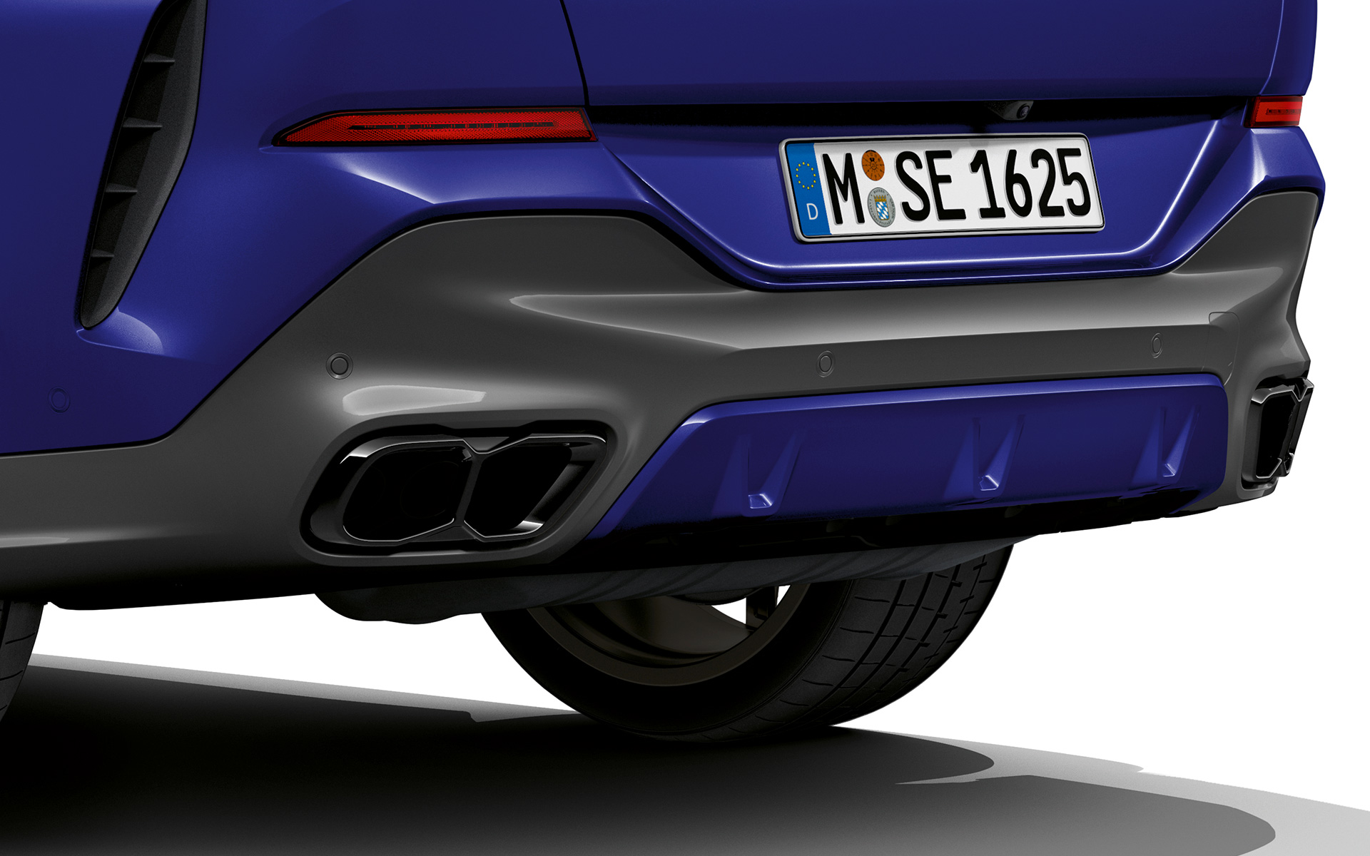 BMW X6 M60i G06 MP exhaust system close-up