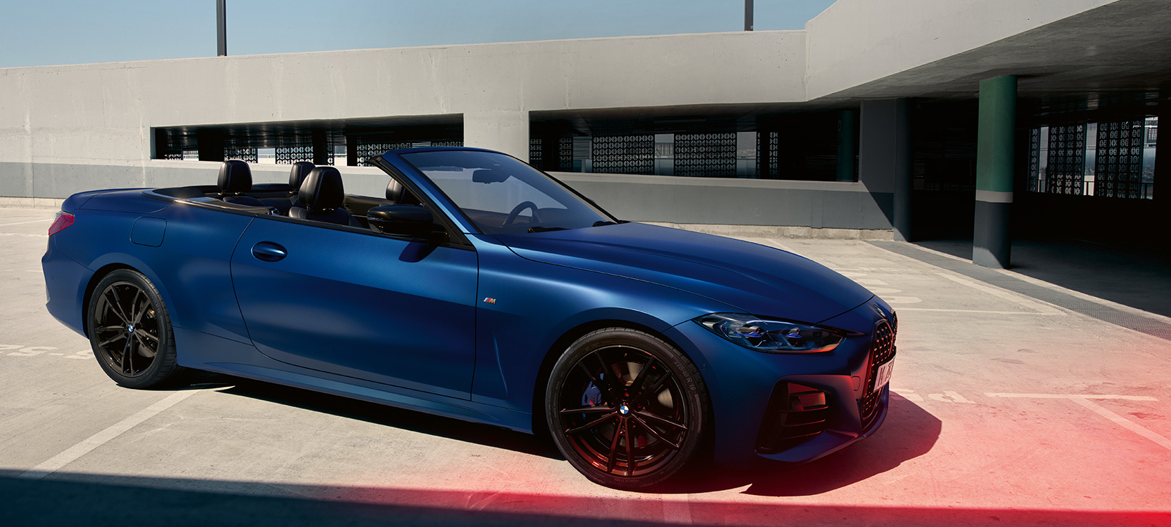 BMW M440i xDrive Convertible G23 2020 BMW Individual Frozen Portimao Blue metallic three-quarter front view 