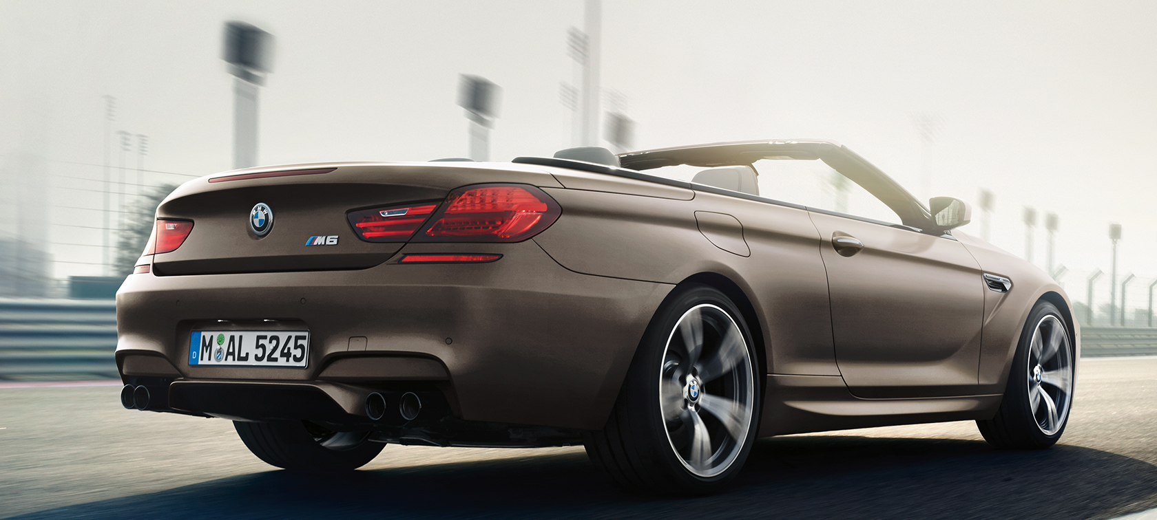 BMW M6 Convertible - Carrosserie marron - Vue latérale arrière BMW M6 Convertible - Carrosserie marron - Vue latérale arrière
