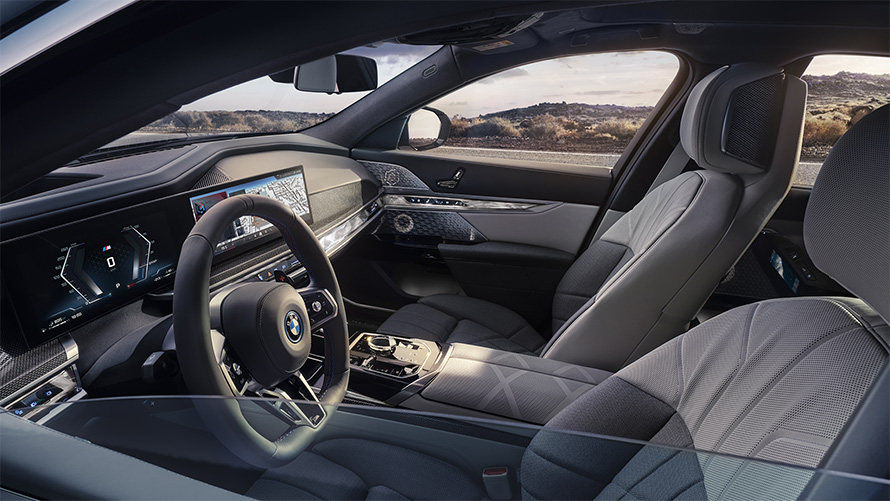 My Mode Sport BMW M760e xDrive Sedan G70 View from the outside through half-closed window glass into the interior