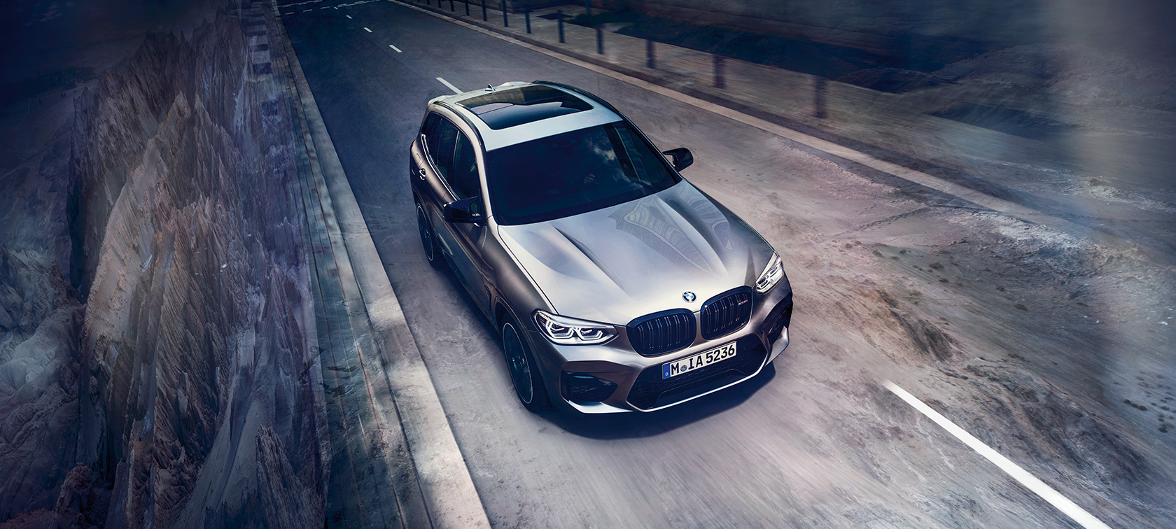 BMW X3 M Competition, bird’s eye view. BMW X3 M Competition in Donington Grey metallic, exterior, bird’s eye view of front.