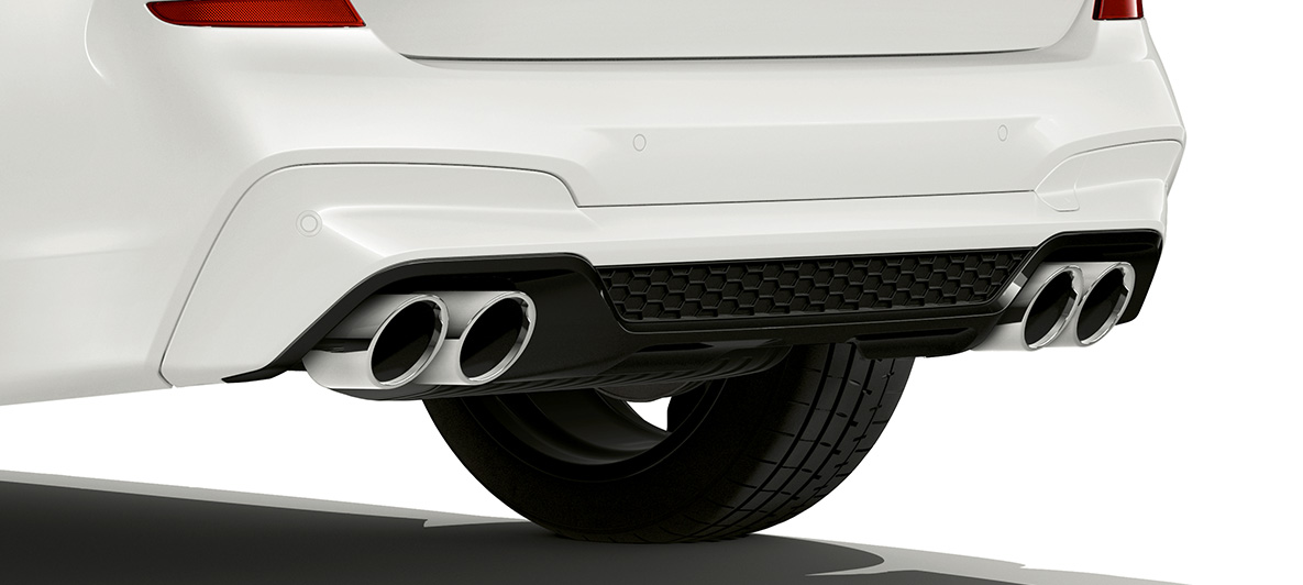 BMW X3 M, rear with exhaust tailpipes in chrome. BMW X3 M in Alpine White, exterior, rear with exhaust tailpipes in chrome.