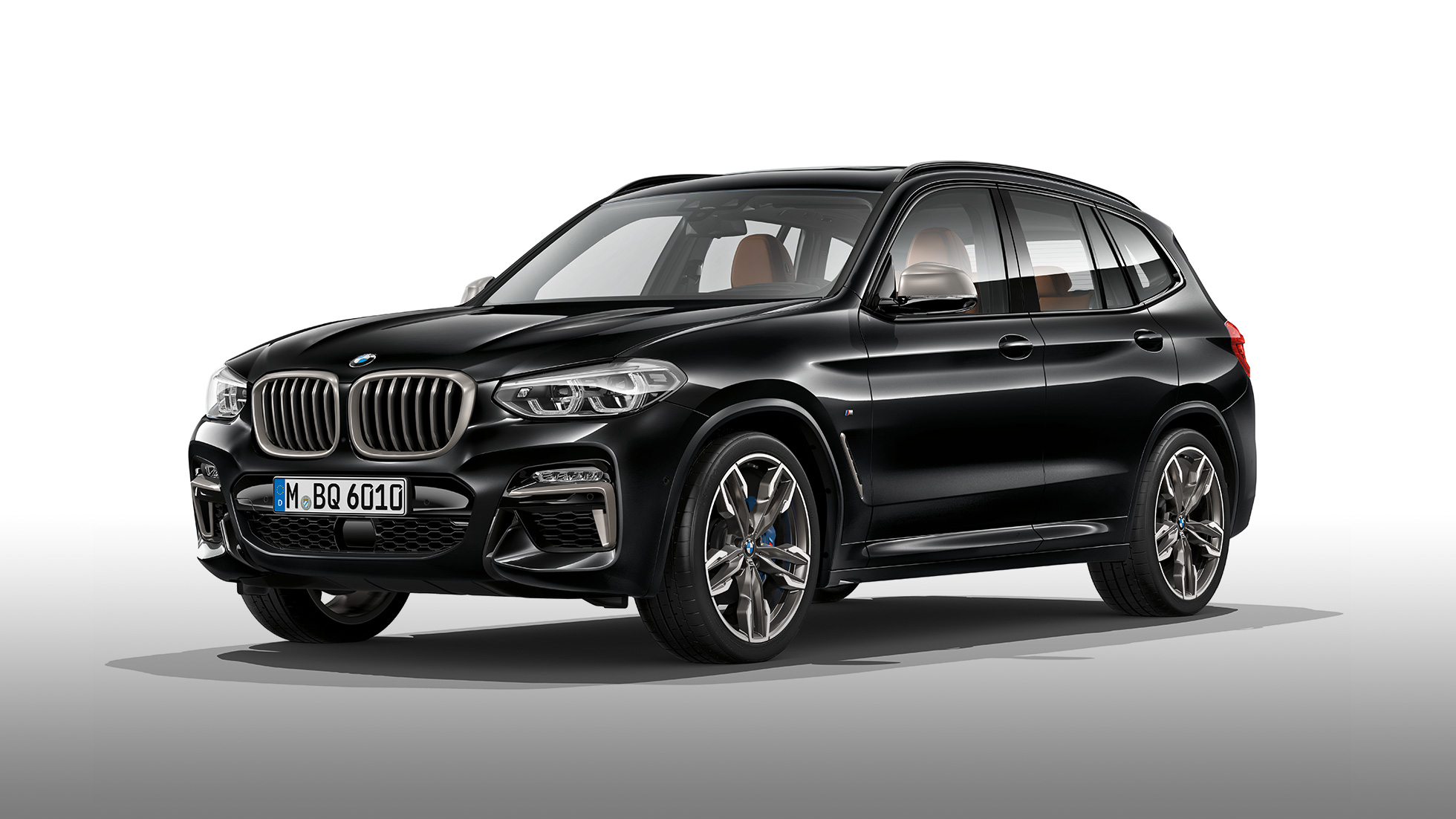 BMW X3 M40i, side view. BMW X3 M40i in Black Sapphire metallic, exterior, side view.
