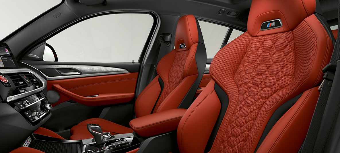 BMW X4 M, sport seats in leather 'Merino' Sakhir Orange. BMW X4 M, interior, sport seats in leather 'Merino' Sakhir Orange.