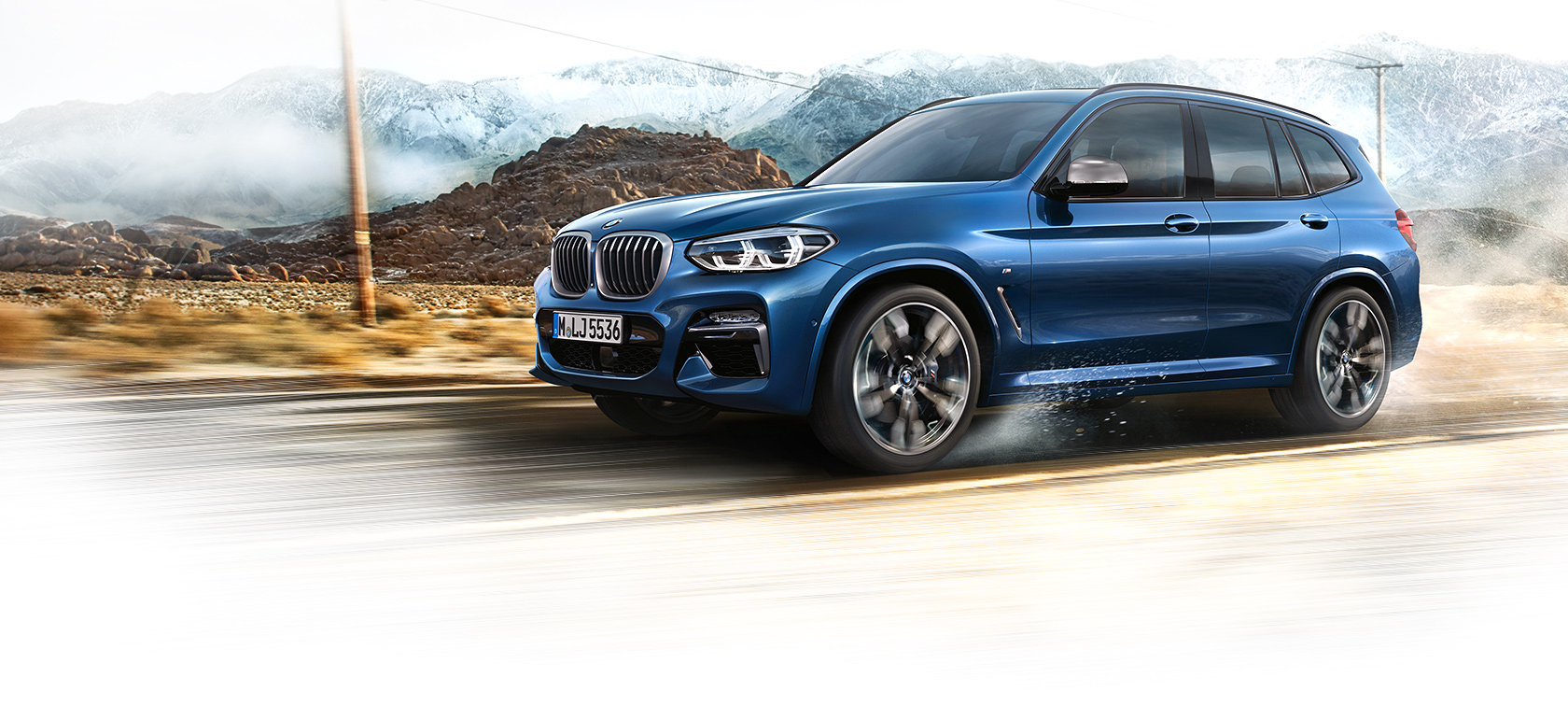 BMW X3 - Carrosserie bleue - Vue latérale essais routier BMW X3 - Carrosserie bleue - Vue latérale essais routier