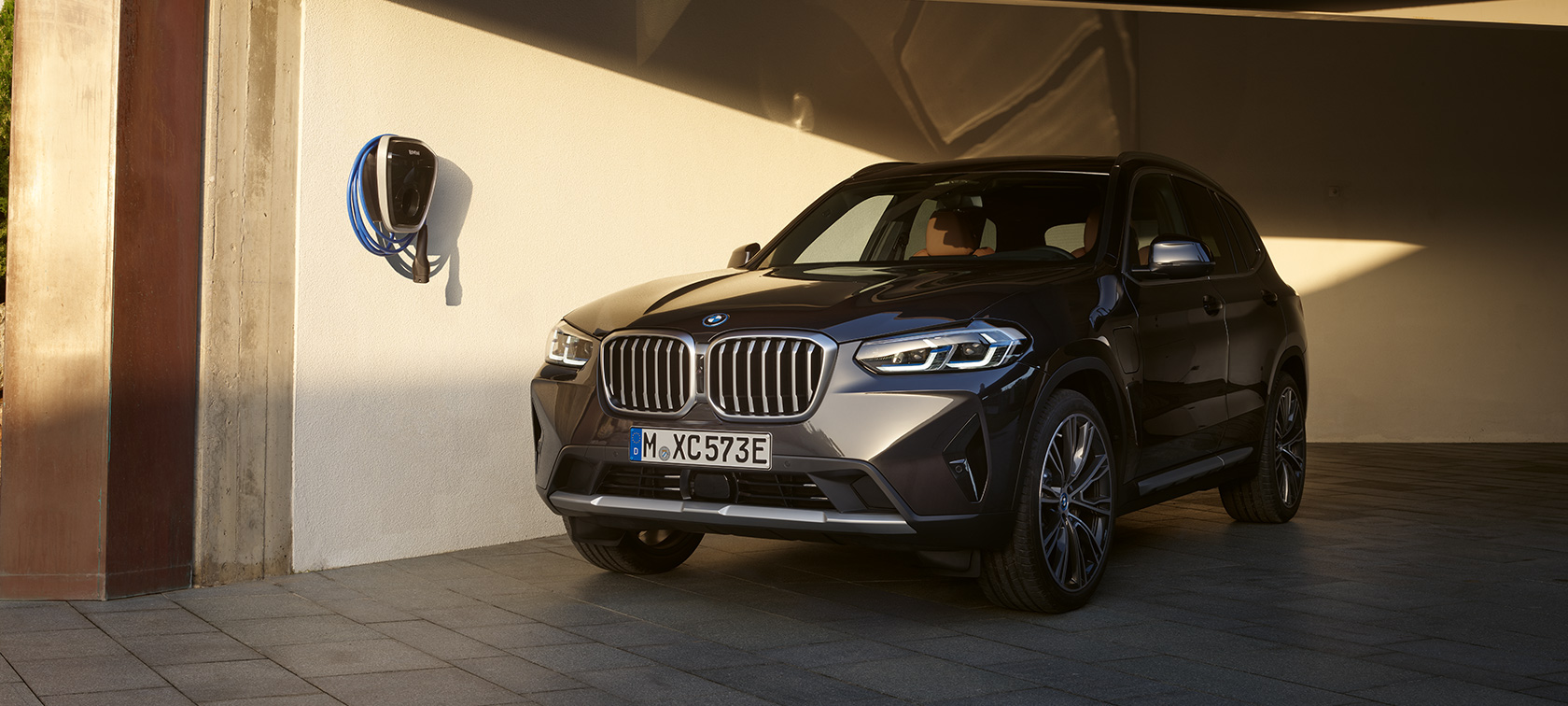 Plug-in hybrid BMW X3 xDrive30e SUV G01 Sophisto Grey 2021 Plug-in hybrid BMW X3 xDrive30e SUV G01 Sophisto Grey three-quarter front view standing 2021