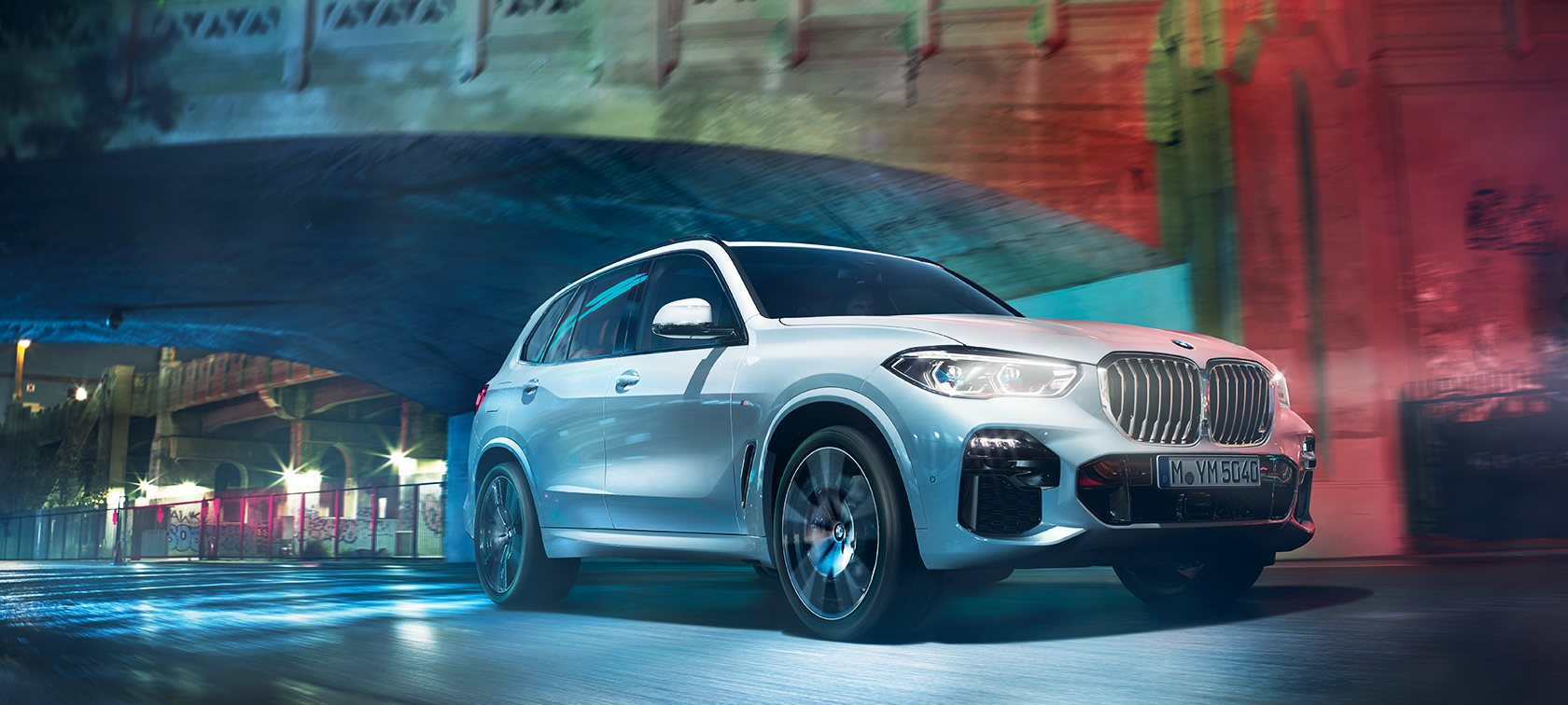 BMW X5 in action The BMW X5 travelling through the city at night