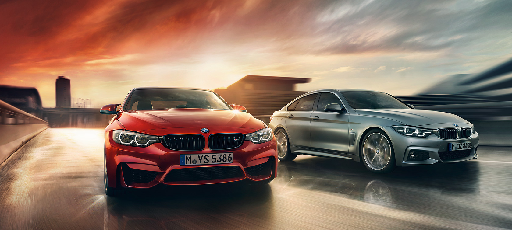BMW M4 et M3 - Carrosserie rouge et grise - Vue de l'extérieure BMW M4 et M3 - Carrosserie rouge et grise - Vue de l'extérieure