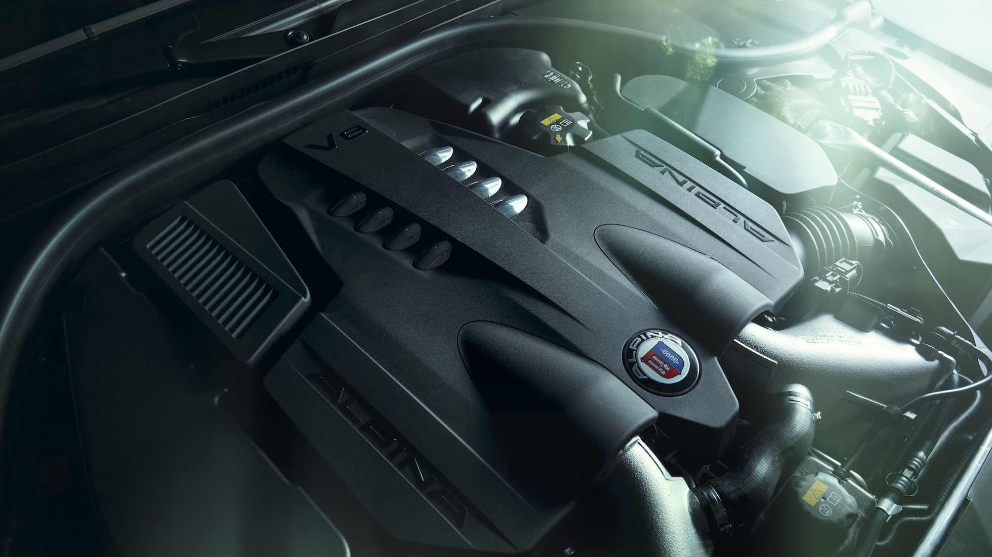 BMW 7 Series Sedan Connectivity features BMW 7 Series Sedan: man sits in BMW and uses Connectivity features