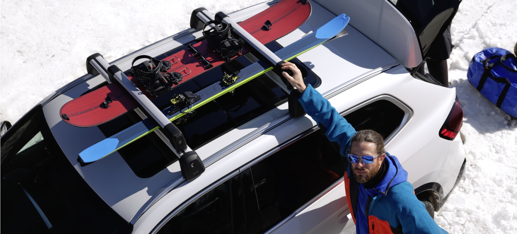 Original BMW Service and Accessories for autumn and winter Man with ski's