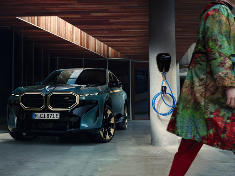 front view of BMW woman walking away