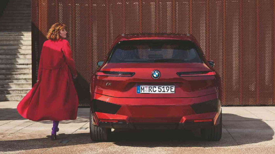 Woman walking towards her BMW