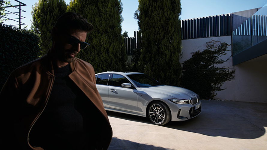 Man walking away from BMW.