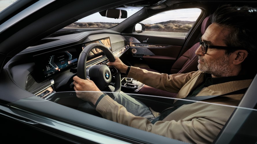 BMW Financial Services BMW three-quarter side view with man on skateboard 