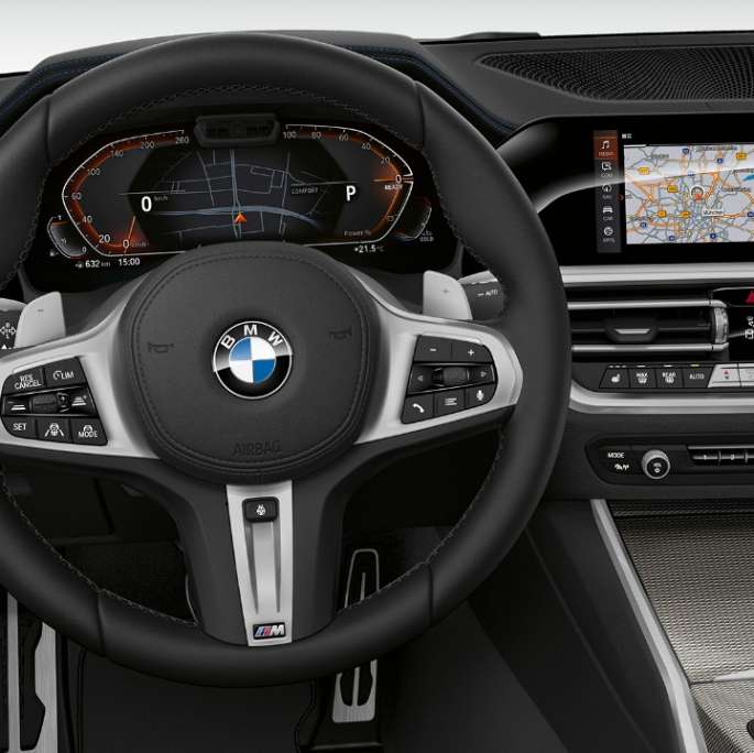 Frontal close-up of the driver's cockpit of the BMW 3 Series Sedan with Sport Line features.