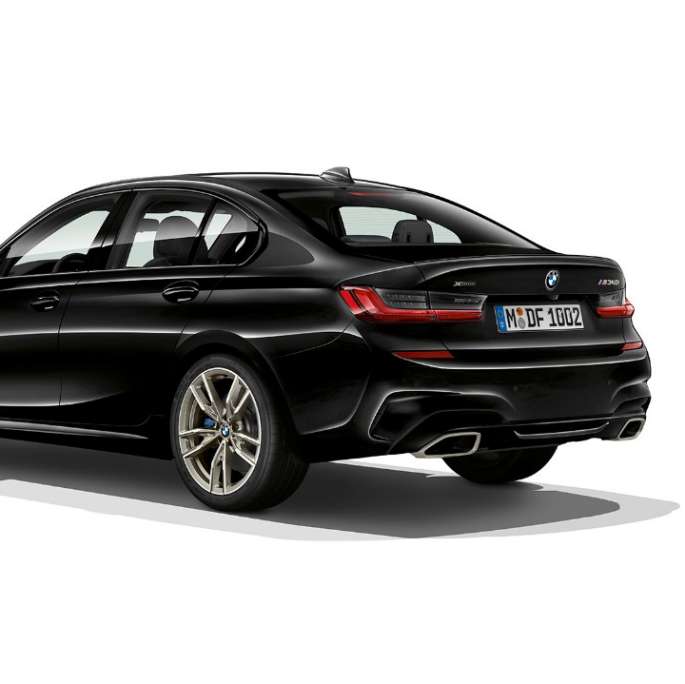 Three-quarter rear shot of the BMW 3 Series M340i xDrive Sedan.