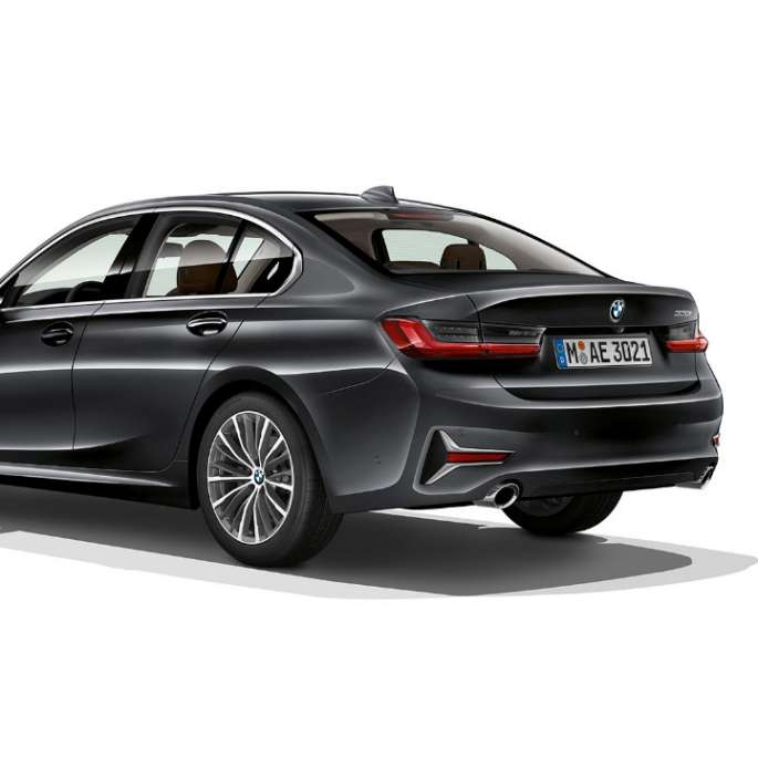 Three-quarter rear shot of the BMW 3 Series Sedan with Model Luxury Line features.