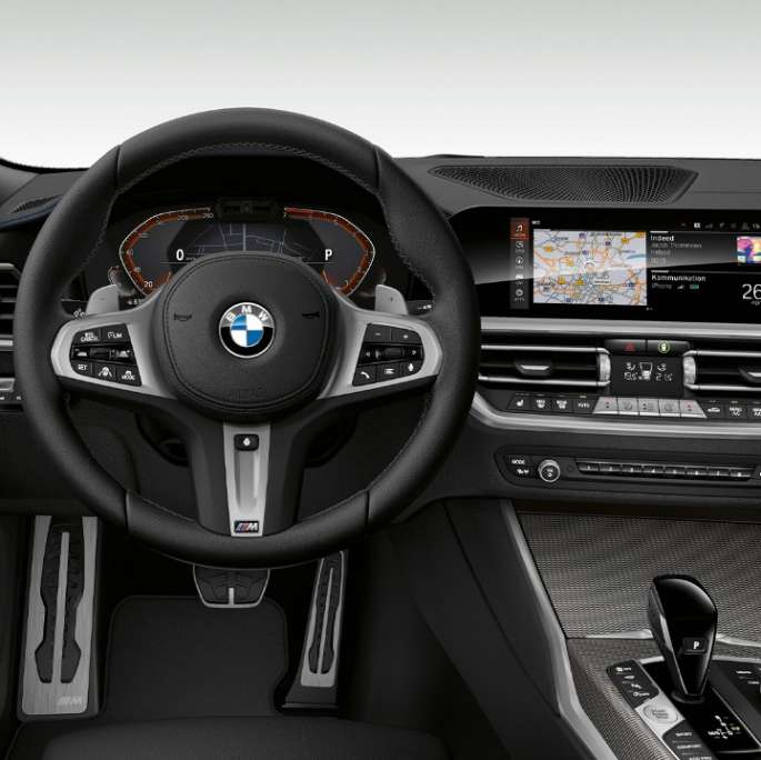 Frontal close-up of the driver's cockpit of the BMW 3 Series Sedan with M Sport package features.